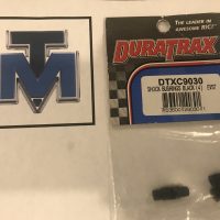 DTXC9030 - Shock Bushings Black (4) - Evader ST